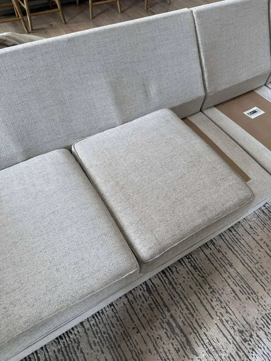 Fabric sofa cushions after professional upholstery cleaning in Spring Hill, FL by Empire DLC Cleanings