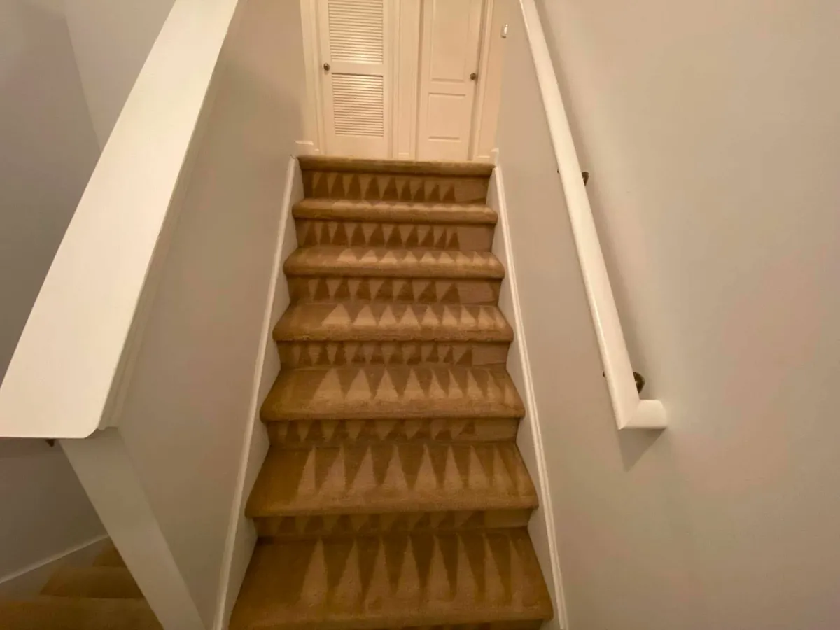 Stair carpet cleaning in Brooksville, FL - clean carpeted steps after hot water extraction by Empire DLC Cleanings