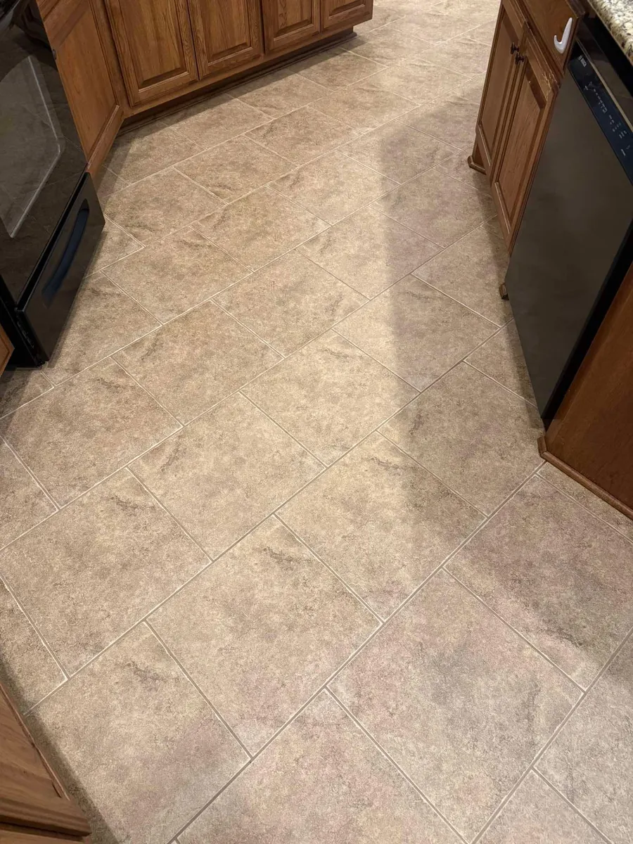 Porcelain kitchen tile and grout cleaning in Spring Hill, FL - clean tile and bright grout lines